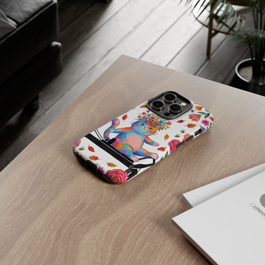 Custodia protettiva per iPhone con gatto floreale colorato su Pilates Reformer